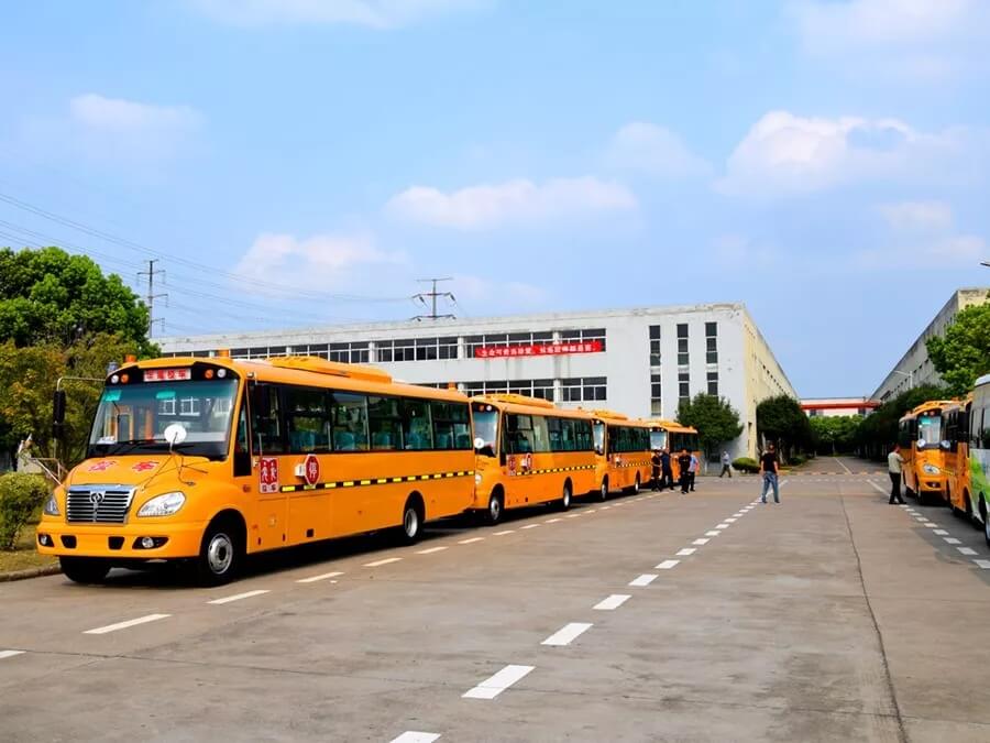 Huaxin brand 9.4m 56 pupils special school bus batch to anhui